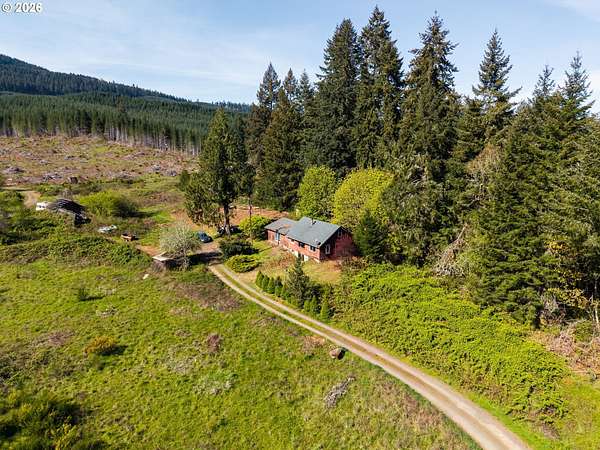 113 Acres of Land with Home for Sale in Noti, Oregon