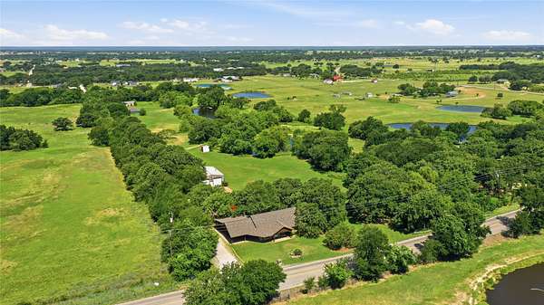 6.2 Acres of Land with Home for Sale in Millsap, Texas