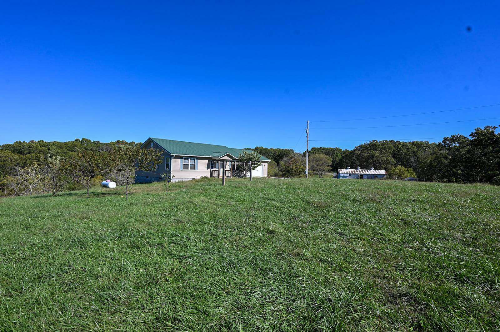 43.5 Acres of Land with Home for Sale in Cassville, Missouri