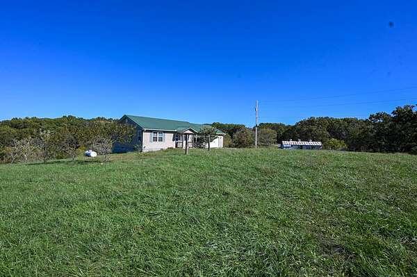 43.5 Acres of Land with Home for Sale in Cassville, Missouri