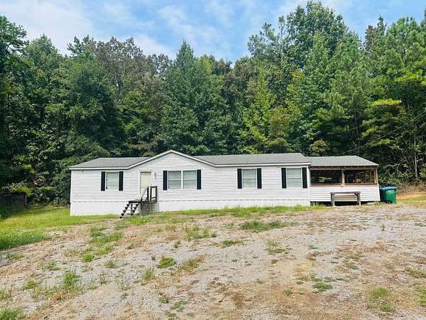 1.6 Acres of Land with Home for Sale in Coffeeville, Mississippi
