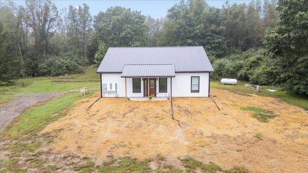 63 Acres of Land with Home for Sale in Albion, Michigan