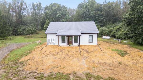 63 Acres of Land with Home for Sale in Albion, Michigan