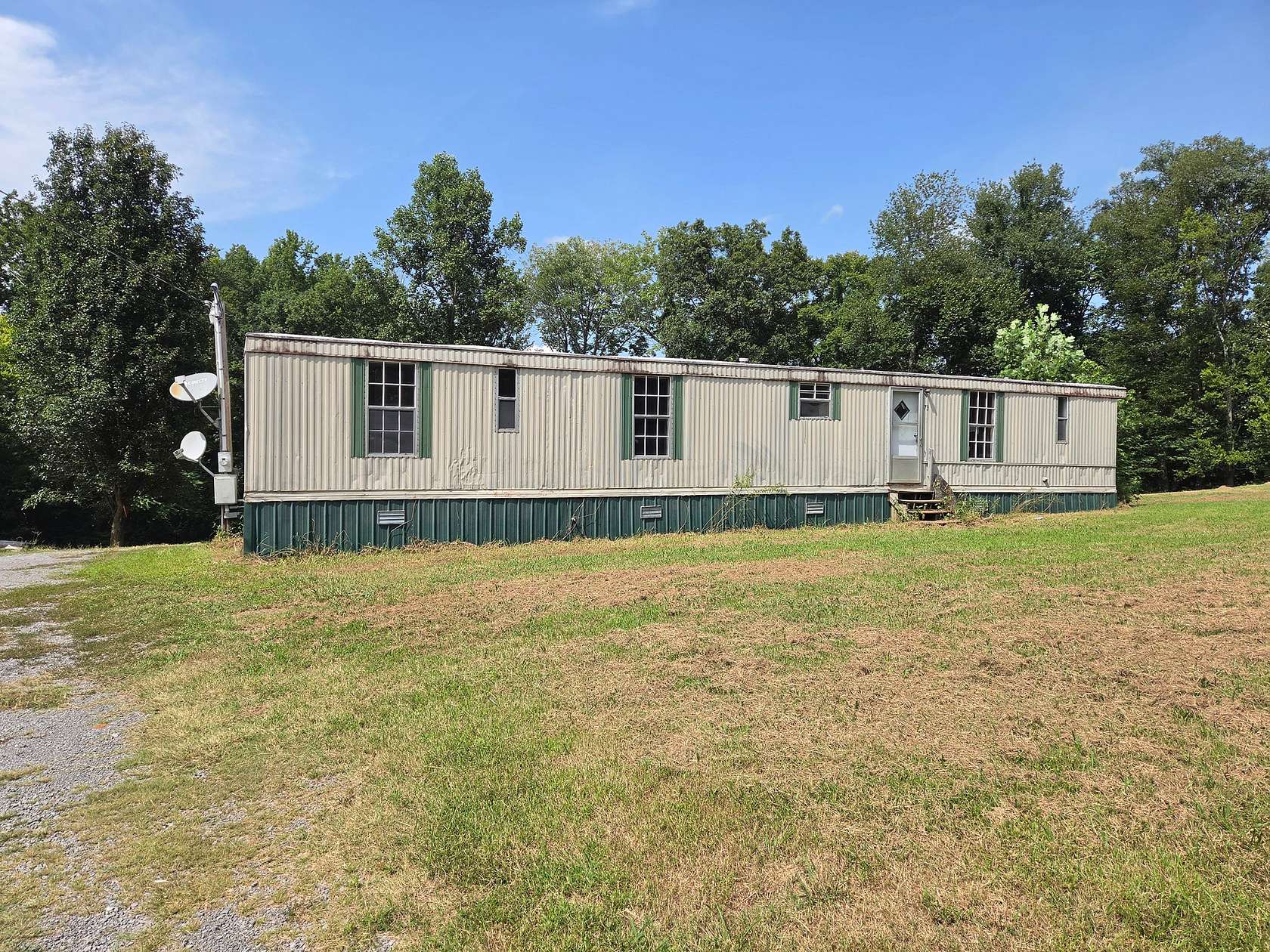 1.73 Acres of Land with Home for Auction in Smithville, Tennessee