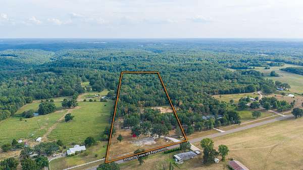 15 Acres of Recreational Land with Home for Sale in Tunas, Missouri
