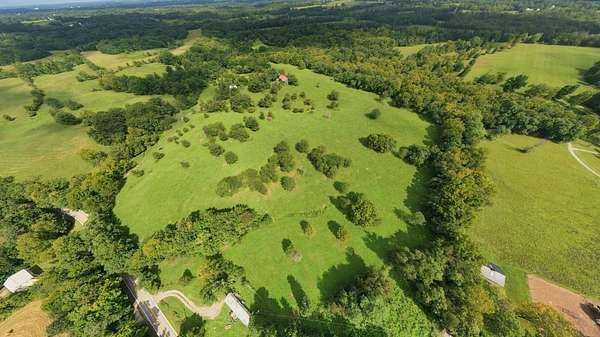 71.1 Acres of Land with Home for Auction in Bagdad, Kentucky