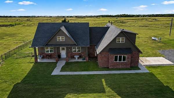 13.4 Acres of Land with Home for Sale in Cashion, Oklahoma