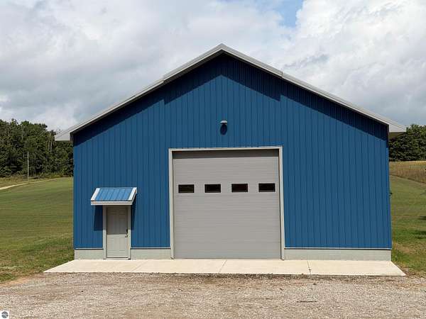 10 Acres of Land with Home for Sale in East Jordan, Michigan
