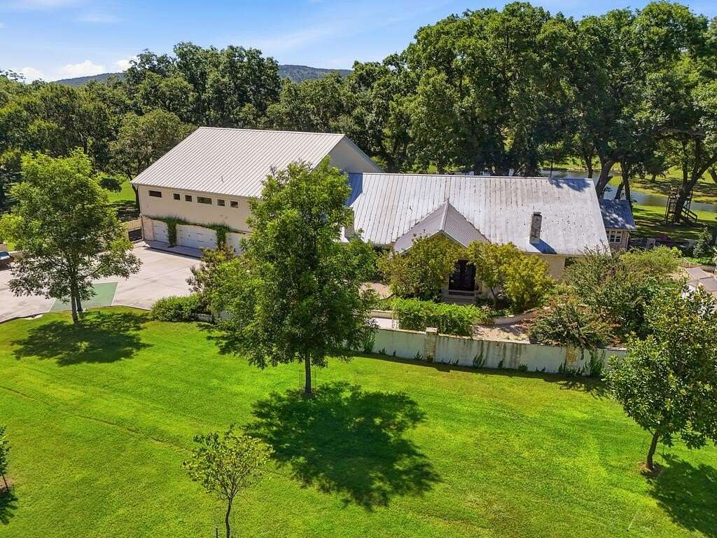 5 Acres of Land with Home for Sale in Concan, Texas