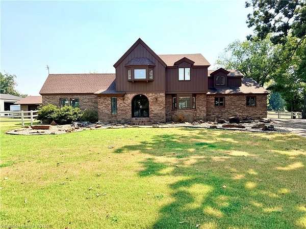 21.9 Acres of Land with Home for Sale in Pocola, Oklahoma