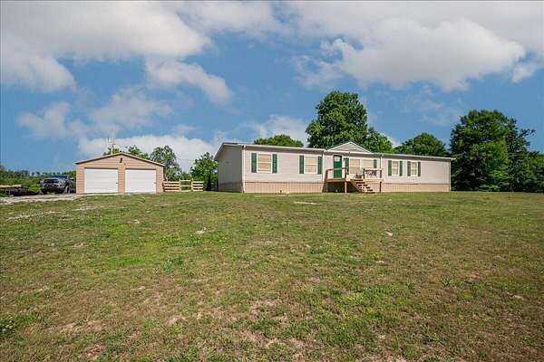 19.5 Acres of Land with Home for Sale in Williamsburg, Kentucky