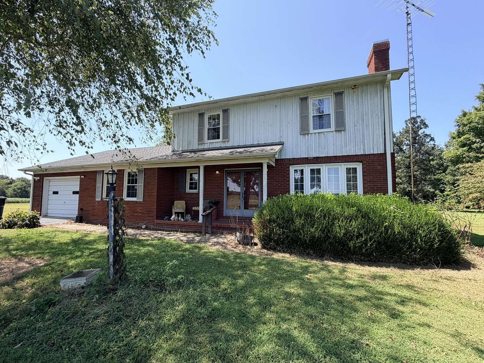 16.6 Acres of Land with Home for Auction in Murray, Kentucky
