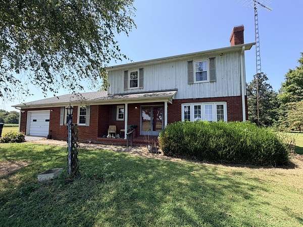 16.6 Acres of Land with Home for Auction in Murray, Kentucky
