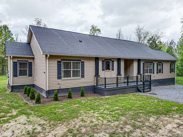 77.4 Acres of Recreational Land with Home for Sale in Centerville, Tennessee