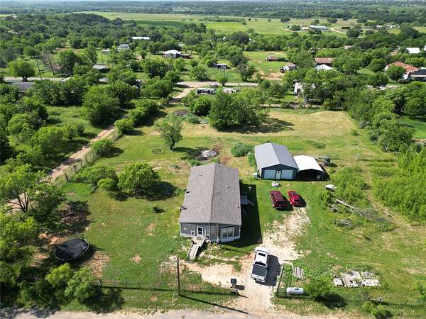 1.59 Acres of Land with Home for Sale in Burkett, Texas