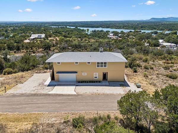 1.76 Acres of Land with Home for Sale in Kingsland, Texas