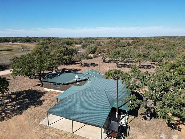 166 Acres of Recreational Land with Home for Sale in Brownwood, Texas
