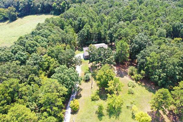 5 Acres of Land with Home for Sale in Mountain View, Arkansas