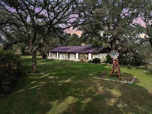 3.46 Acres of Land with Home for Sale in Sheridan, Texas