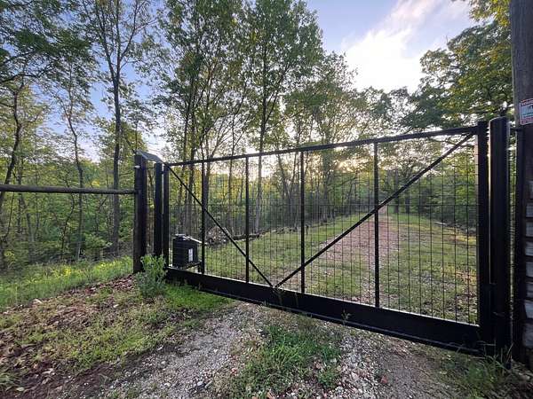 444 Acres of Recreational Land with Home for Sale in Exeter, Missouri