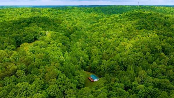 128 Acres of Recreational Land with Home for Sale in Fordsville, Kentucky
