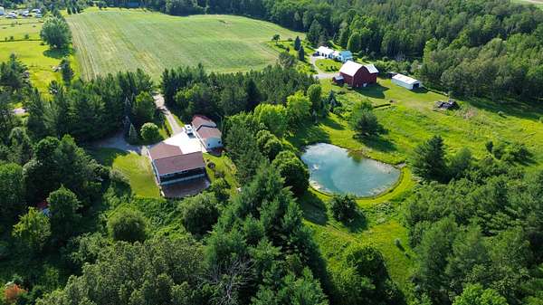 29 Acres of Recreational Land with Home for Sale in Rose City, Michigan
