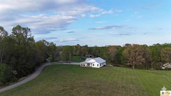 76 Acres of Land with Home for Sale in Magnolia, Kentucky