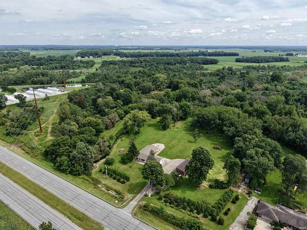 21.7 Acres of Recreational Land with Home for Sale in Rolling Prairie, Indiana