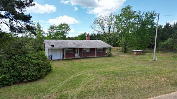 32.3 Acres of Recreational Land with Home for Sale in Red Level, Alabama