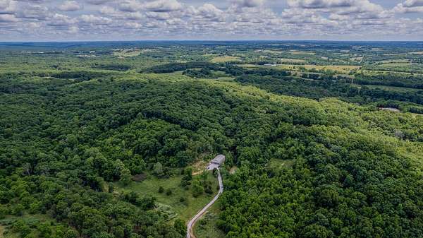 75 Acres of Recreational Land with Home for Sale in Highlandville, Missouri