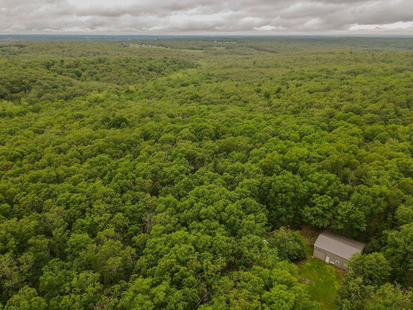 178 Acres of Recreational Land with Home for Sale in Long Lane, Missouri