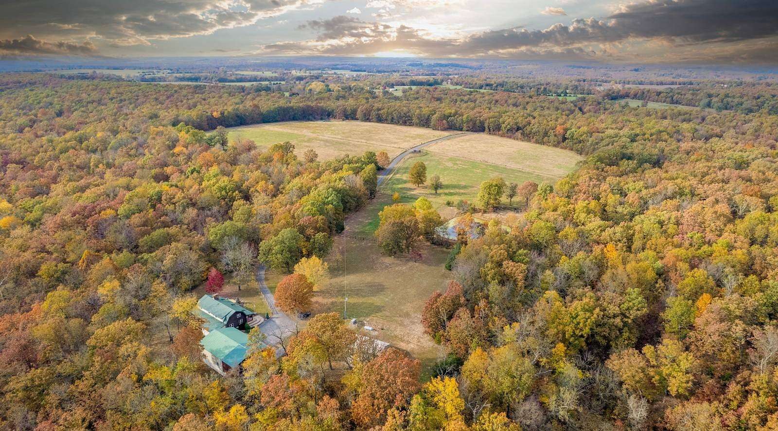 313 Acres of Land with Home for Sale in Long Lane, Missouri