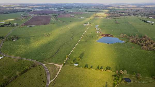 194 Acres of Agricultural Land with Home for Sale in Conway, Missouri