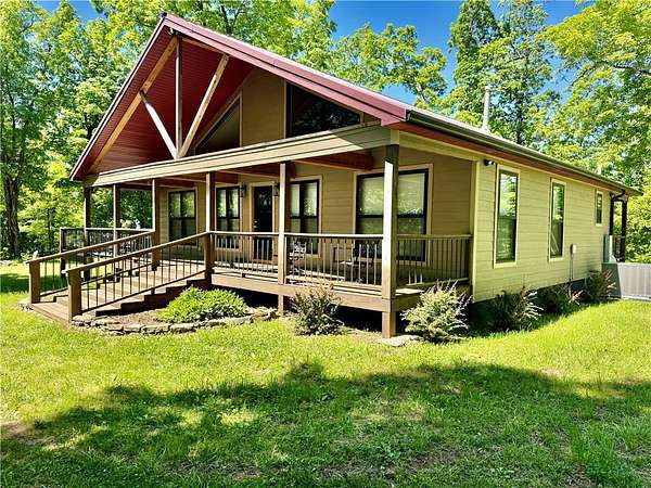 31.6 Acres of Recreational Land with Home for Sale in Pettigrew, Arkansas