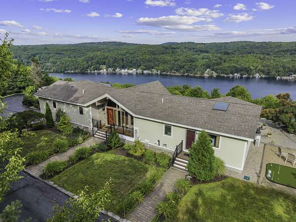 11 Acres of Land with Home for Sale in Alton, New Hampshire