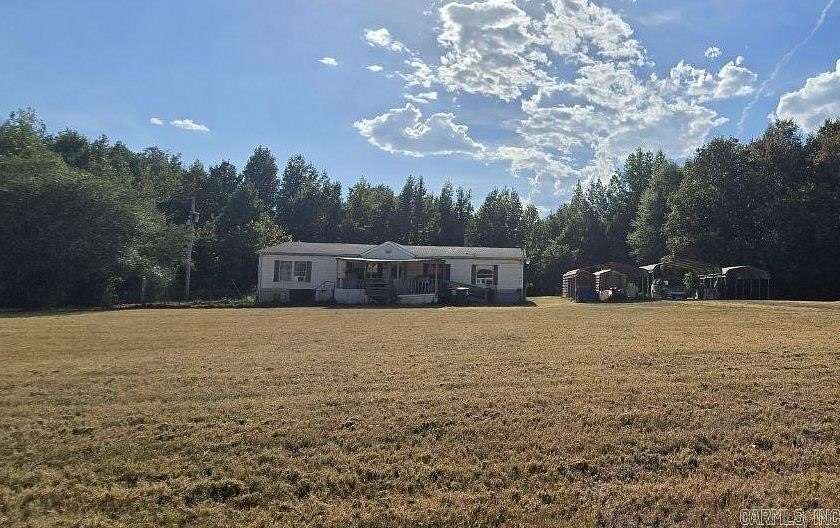 7.67 Acres of Land with Home for Sale in Belleville, Arkansas