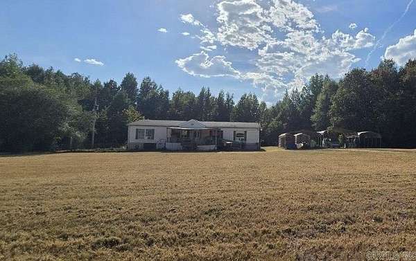 7.67 Acres of Land with Home for Sale in Belleville, Arkansas