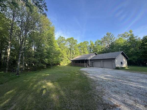 15 Acres of Recreational Land with Home for Sale in Glennie, Michigan