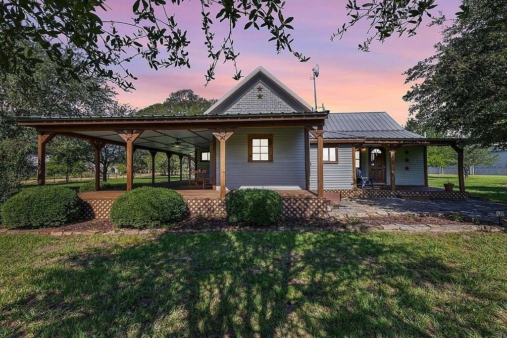 12 Acres of Land with Home for Sale in Rock Island, Texas