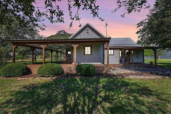 12 Acres of Land with Home for Sale in Rock Island, Texas