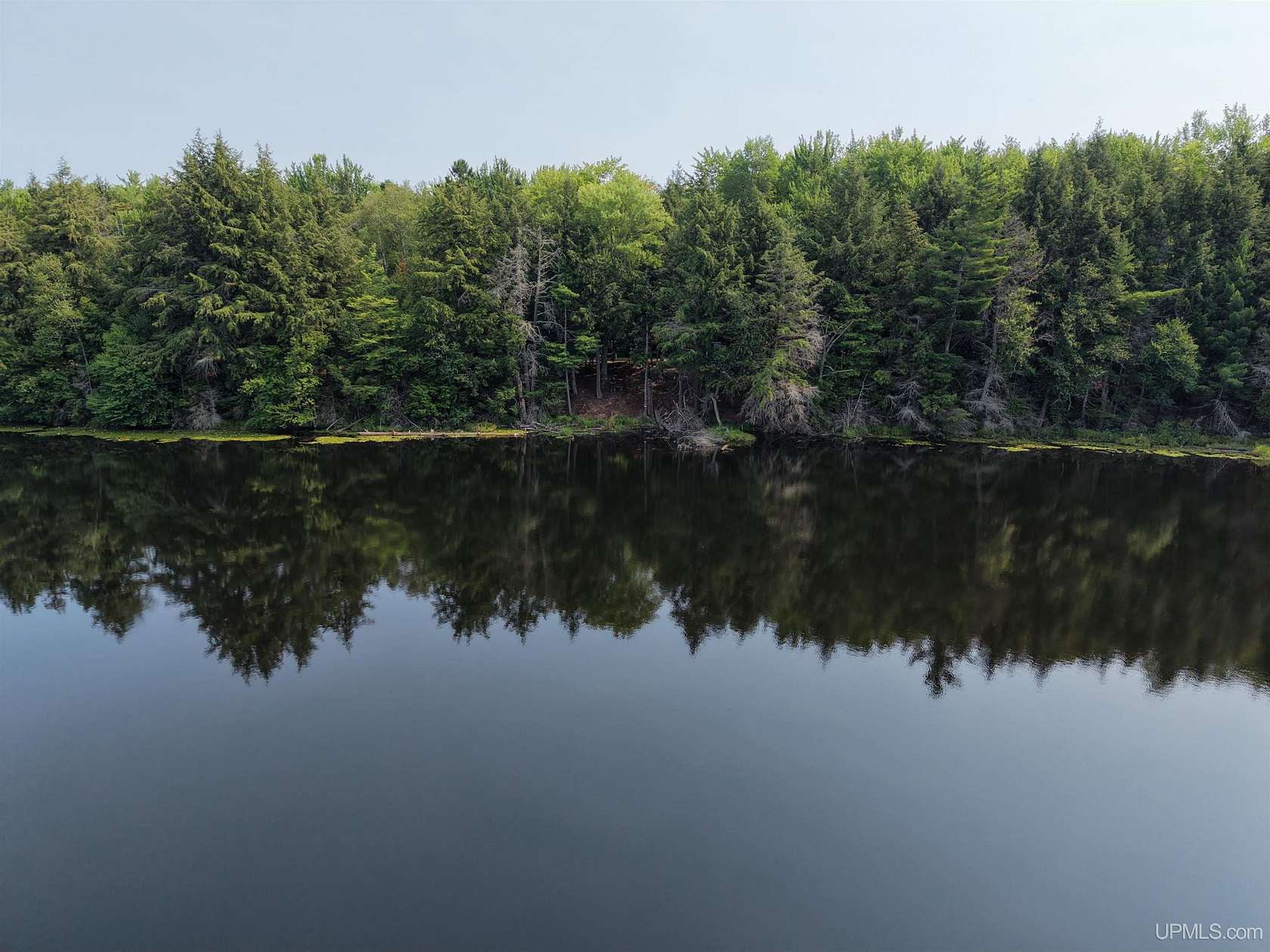 143 Acres of Recreational Land with Home for Sale in Wetmore, Michigan