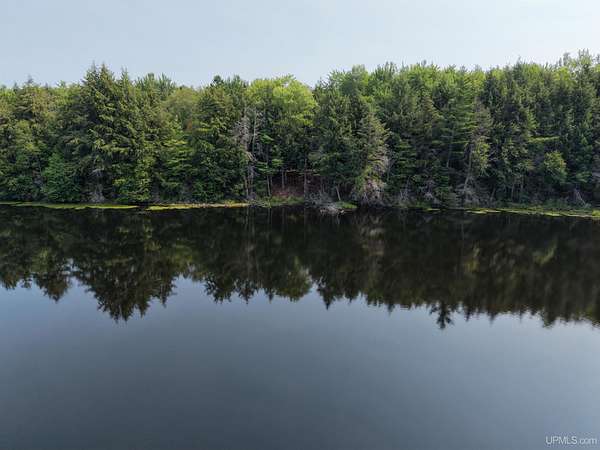 143 Acres of Recreational Land with Home for Sale in Wetmore, Michigan