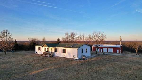 81.3 Acres of Recreational Land with Home for Sale in Elm Township, Missouri