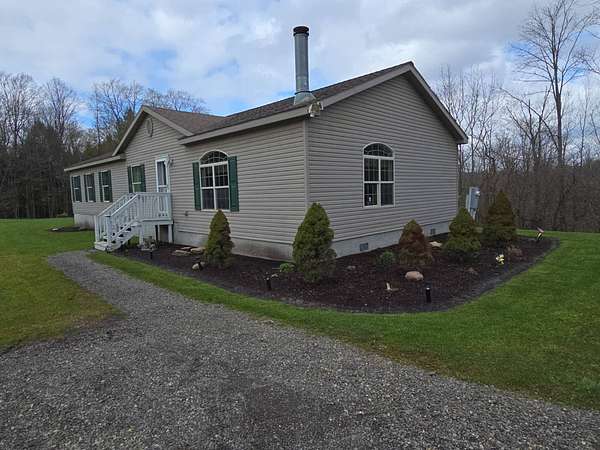 3.83 Acres of Land with Home for Sale in South Plymouth, New York