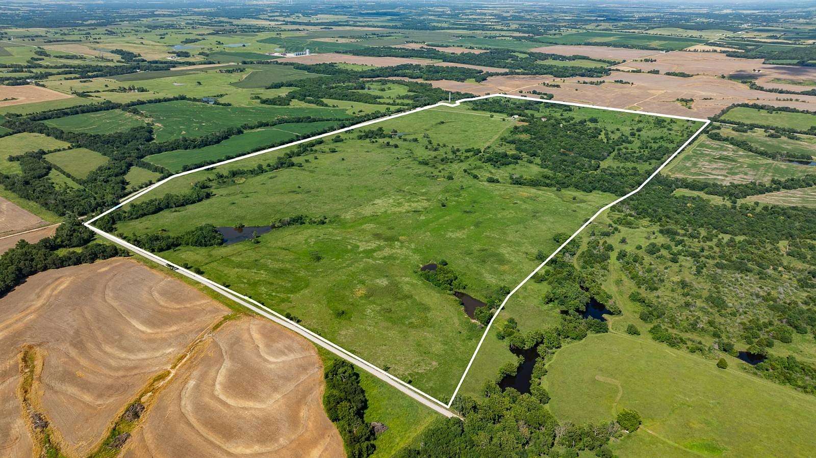 315 Acres of Land with Home for Auction in Cherryvale, Kansas