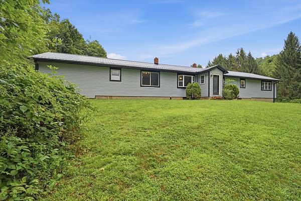 11.3 Acres of Land with Home for Sale in Saegertown, Pennsylvania