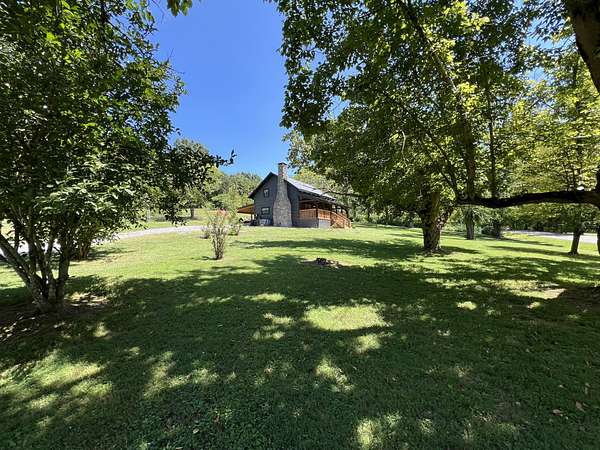 4.36 Acres of Land with Home for Sale in Cottontown, Tennessee