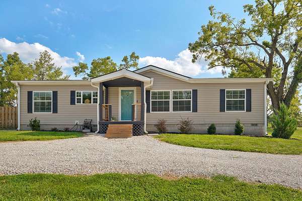 6.76 Acres of Land with Home for Sale in Sparta, Missouri