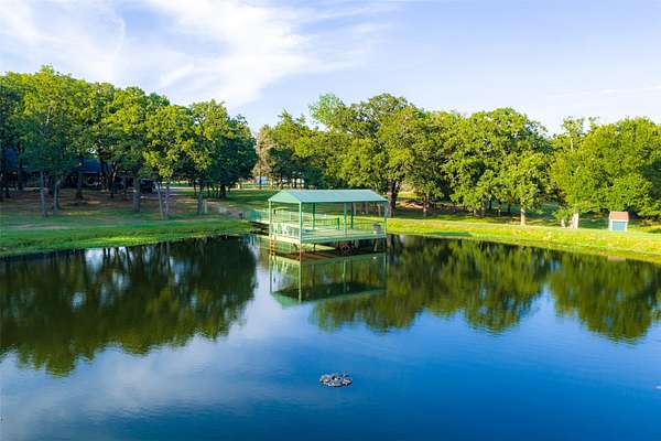 117 Acres of Recreational Land with Home for Sale in Kemp, Texas