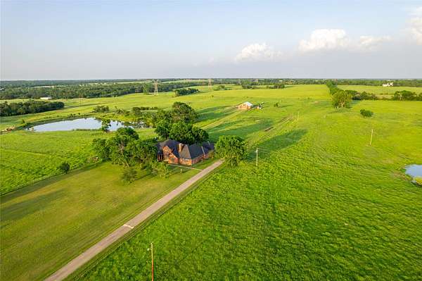 56.3 Acres of Land with Home for Sale in Ravenna, Texas